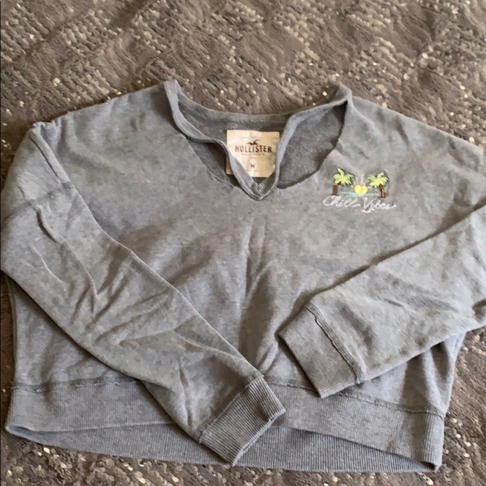 grey cut hollister sweater with embroidery